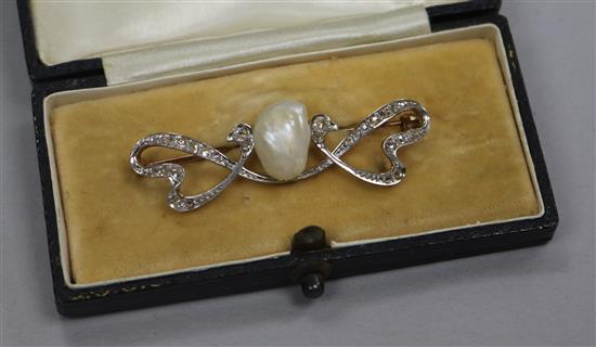 An Art Nouveau yellow metal, rose cut diamond and baroque pearl brooch, maker B.S&F, 48mm.